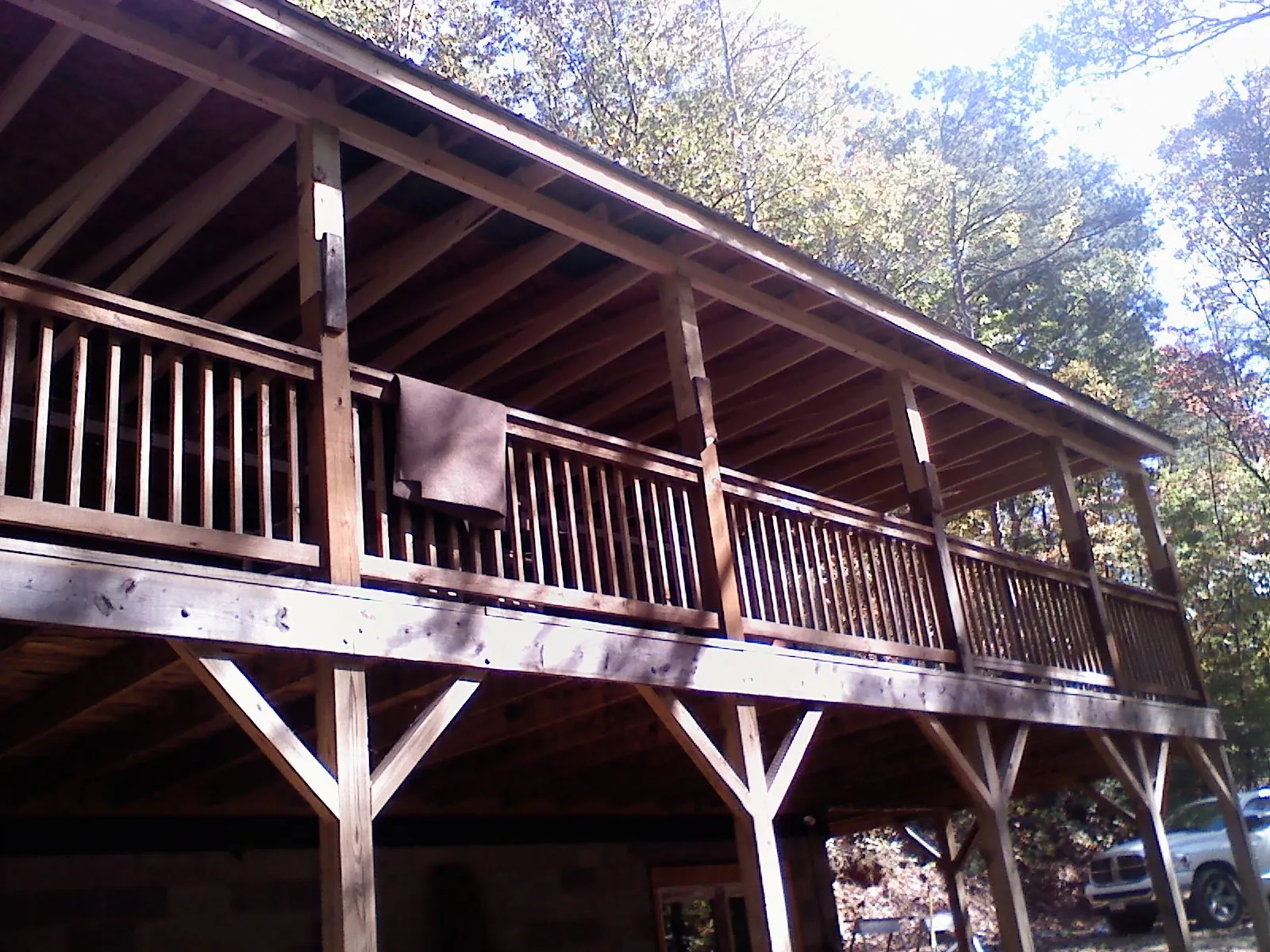 Timber framing under a new elevated porch and deck — Roof Leak Repair in Piffard by Roofing Brothers